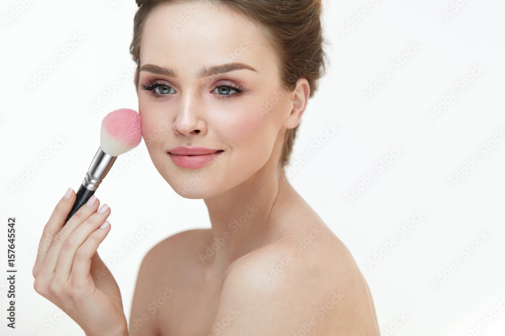 Woman Face Beauty. Sexy Girl Putting Blush With Facial Brush Woman Face Beauty. Sexy Girl Putting Blush With Facial Brush