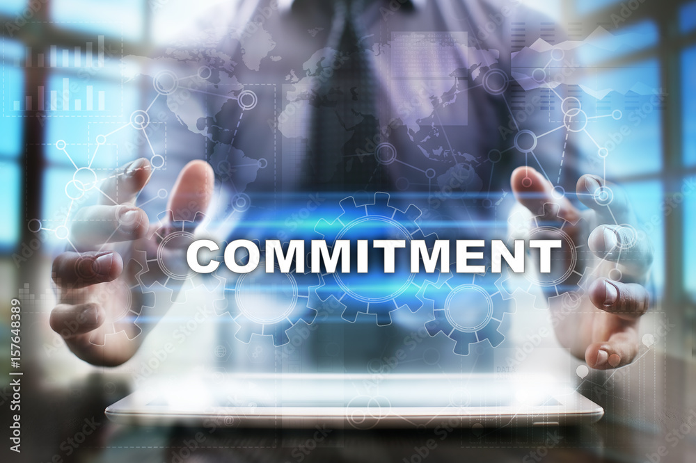 Businessman using tablet pc and selecting commitment. Businessman using tablet pc and selecting commitment.