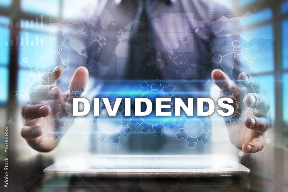 Businessman using tablet pc and selecting dividends. Businessman using tablet pc and selecting dividends.