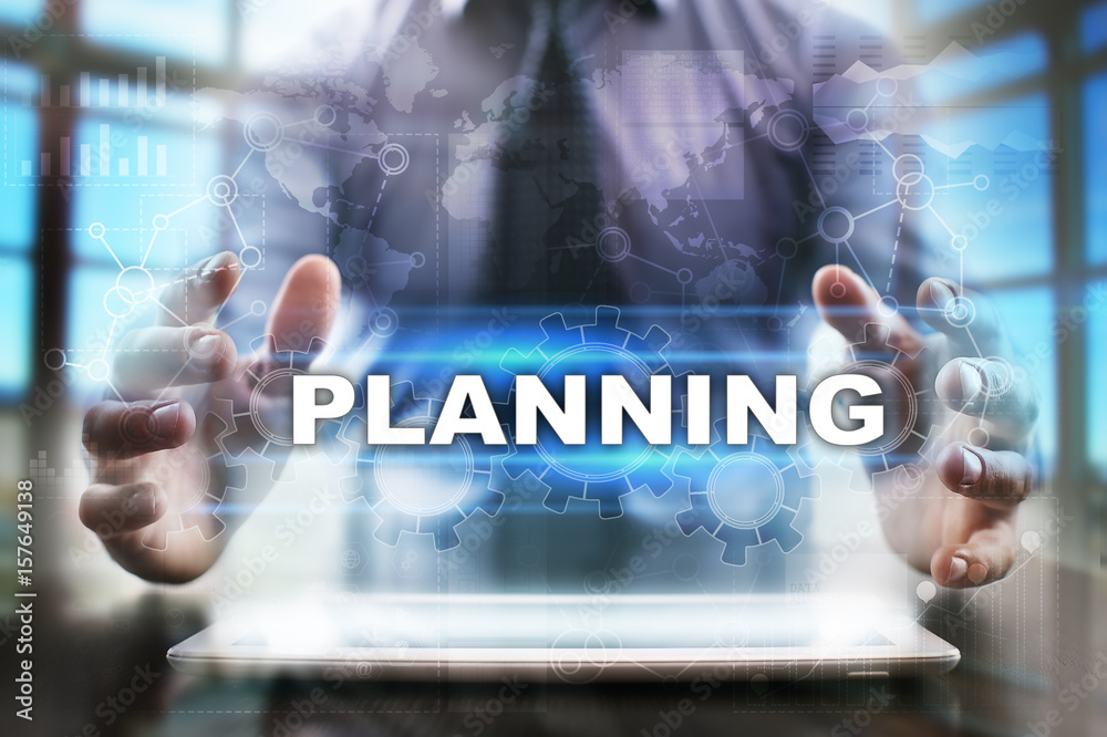 Businessman using tablet pc and selecting planning. Businessman using tablet pc and selecting planning.