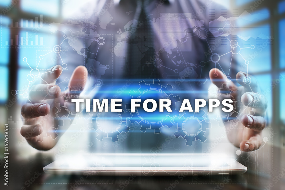 Businessman using tablet pc and selecting time for apps. Businessman using tablet pc and selecting time for apps.