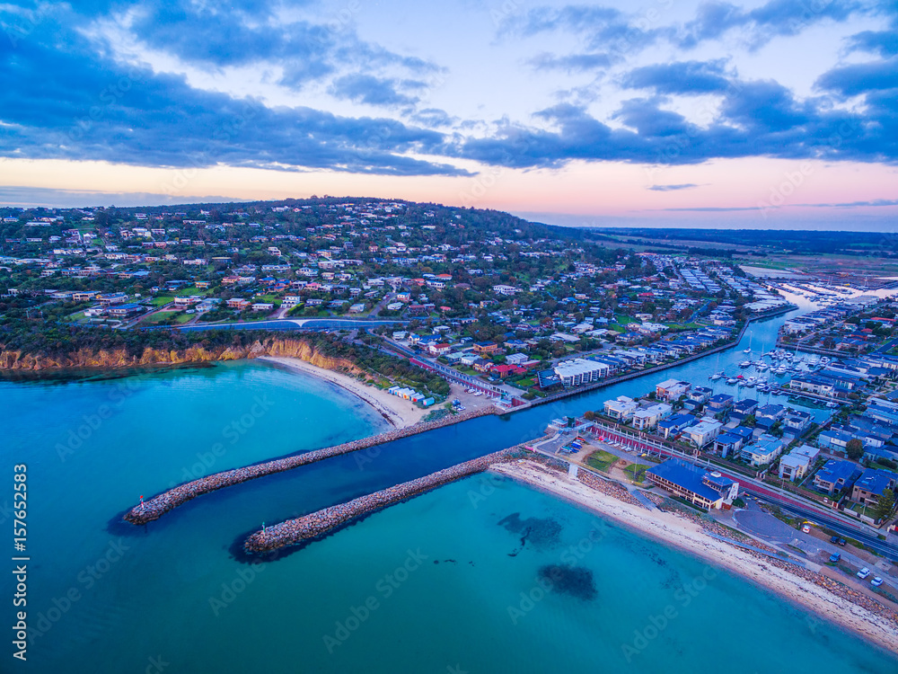 Waterway entrance from Port Phillip Bay into the Safety Beach marina. Mornington Peninsula suburban area aerial view. Melbourne, Australia