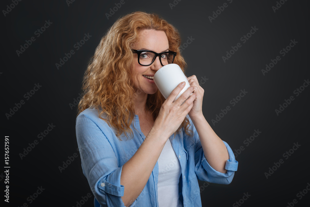 Graceful lady enjoying refreshing coffee Graceful lady enjoying refreshing coffee