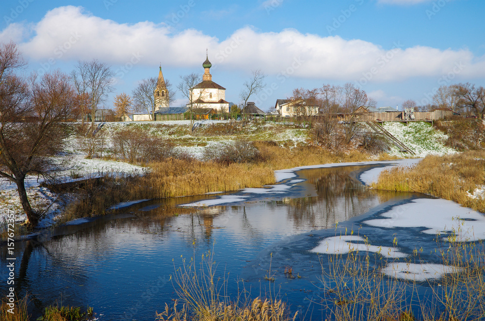 SUZDAL, RUSSIA - November, 2016: View of the old church in Suzdal. The Holy Cross Church and the Church of Cosmas and Damian SUZDAL, RUSSIA - November, 2016: View of the old church in Suzdal. The Holy Cross Church and the Church of Cosmas and Damian