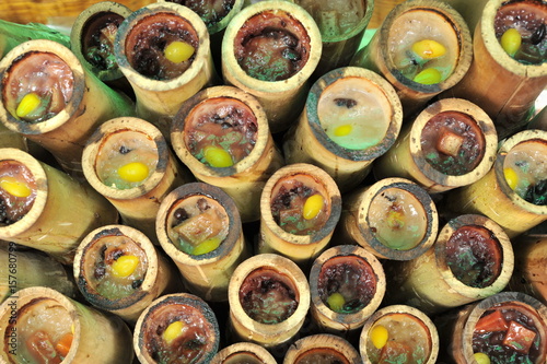 glutinous rice roasted in bamboo joints photo