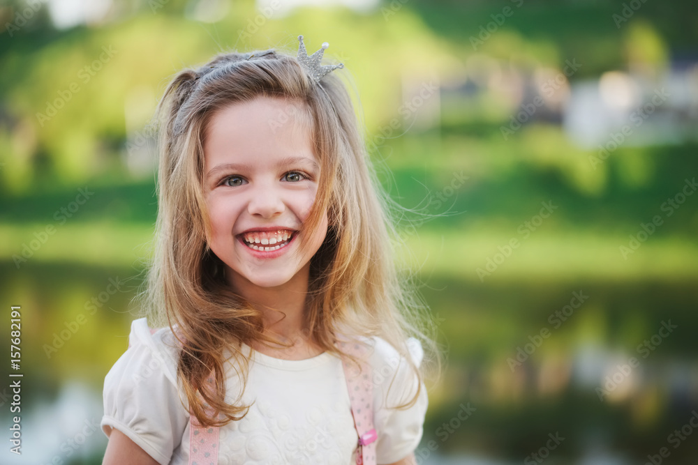 cute little girl in summer park