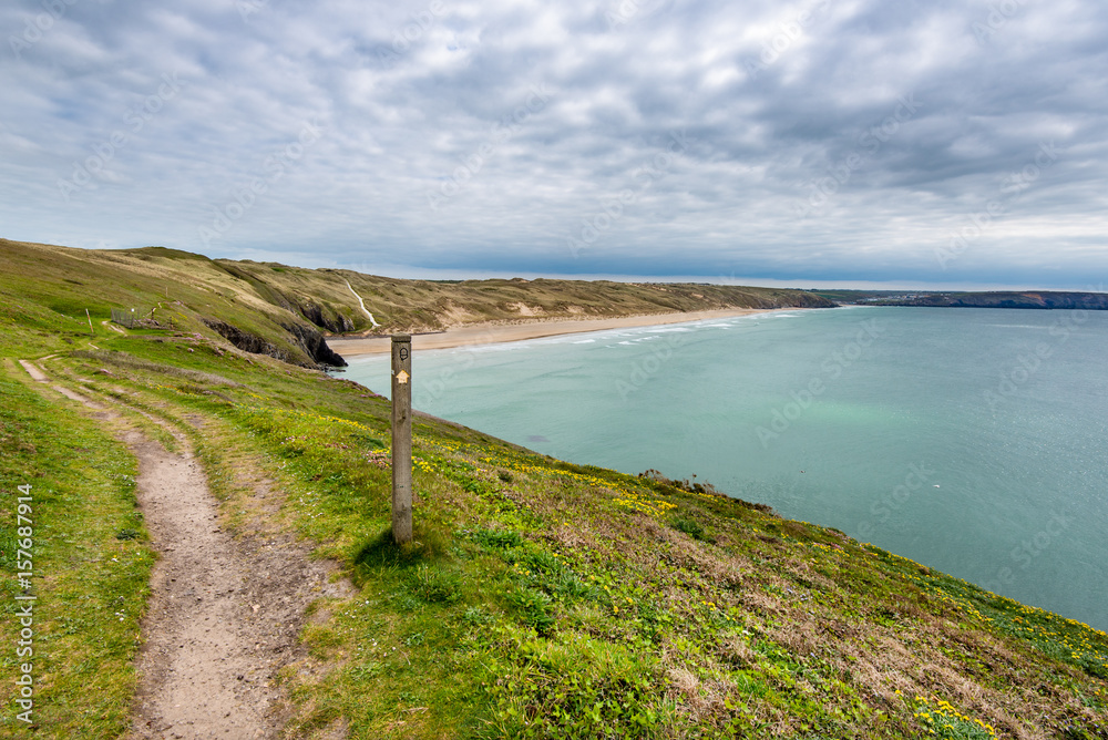 The Cornish Coast Path, looking south from  from Ligger Point towards Perran Sands and Perranporth.