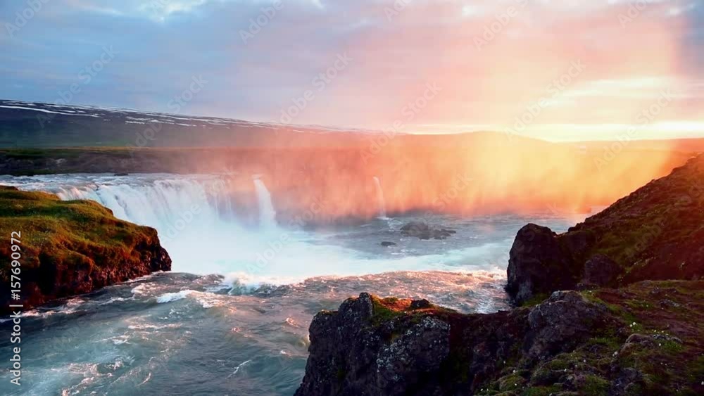 Fantastic sunset. Hodafoss very beautiful Icelandic waterfall 12 meters high. It is located in the north near Lake Myvatn. Fantastic sunset. Hodafoss very beautiful Icelandic waterfall 12 meters high. It is located in the north near Lake Myvatn.