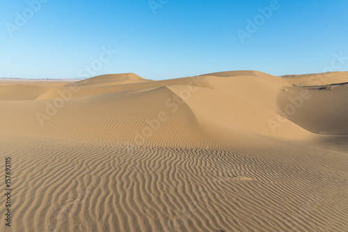 sand dunes in the desert  Dasht-e Kavir  at sunset in Iran