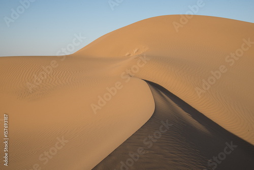 sand dunes in the desert "Dasht-e Kavir" at sunset in Iran