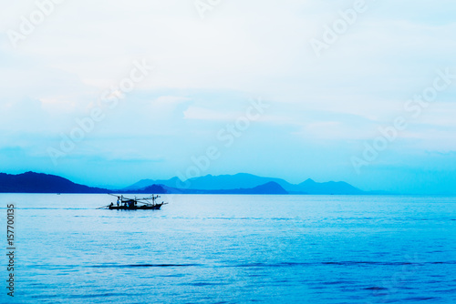 silhouette long tail boat at sunset,Koh Tao,Thailand © Hide_Studio