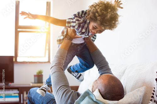 Father playing with son photo