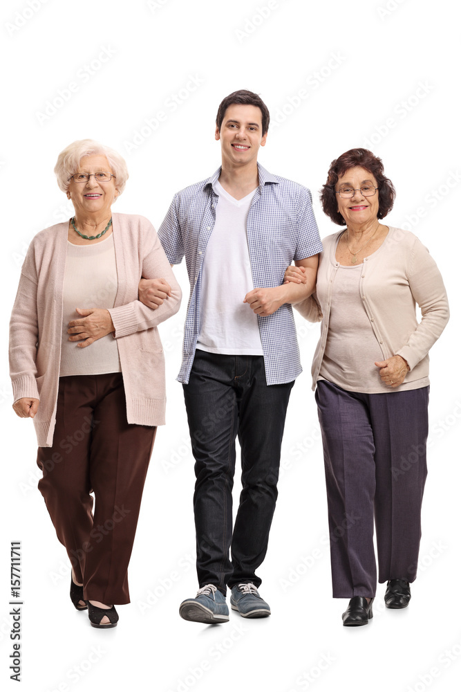 Young with two mature women walking towards the camera Young with two mature women walking towards the camera