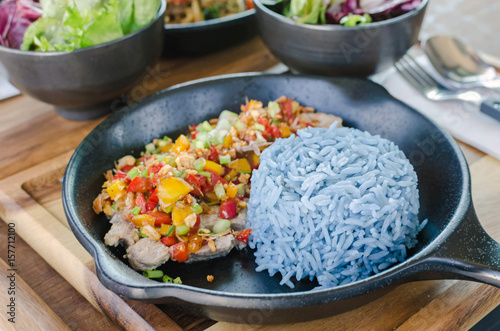 Food healthy, garlic pork with blue rice, blue color made from butterfly pea (Blue Pea).