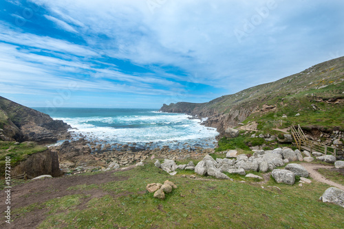 Nanjizal or Mill Bay is a cove 2km south of Lands End, Cornwall, UK that can only be reached on foot.  The far headland is Carn Boel. photo
