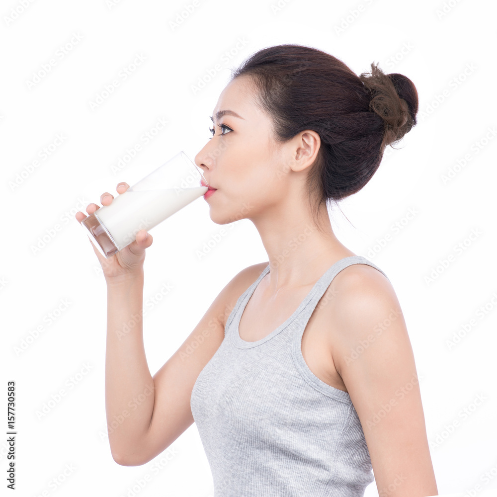 Healthy nutrition. Happy young asian woman drinking milk Healthy nutrition. Happy young asian woman drinking milk
