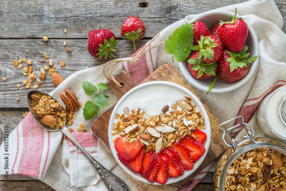 Breakfast - yogurt with granola and straberries Breakfast - yogurt with granola and straberries