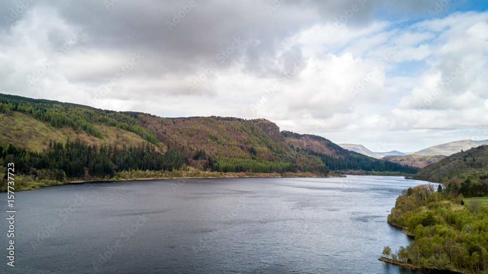 Thirlmere, Lake District, England. Aerial drone view north over Thirlmere reservoire in the English Lake District in Cumbria on a cloudy spring day.