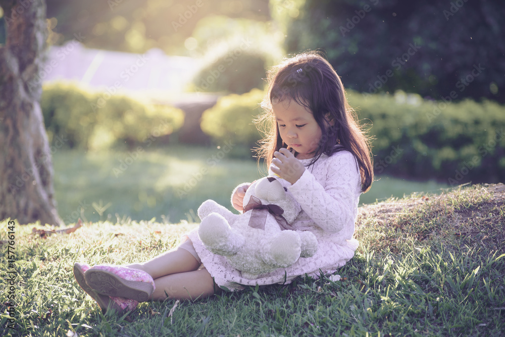 Girl hugging hotsell stuffed animal