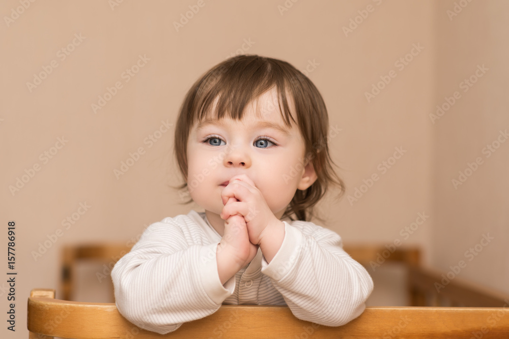 portrait of adorable baby girl with blue eyes, indoors portrait of adorable baby girl with blue eyes, indoors