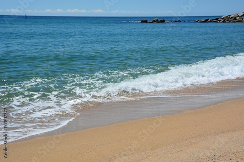 Clean beach of the Mediterranean Sea on a sunny day © axynia