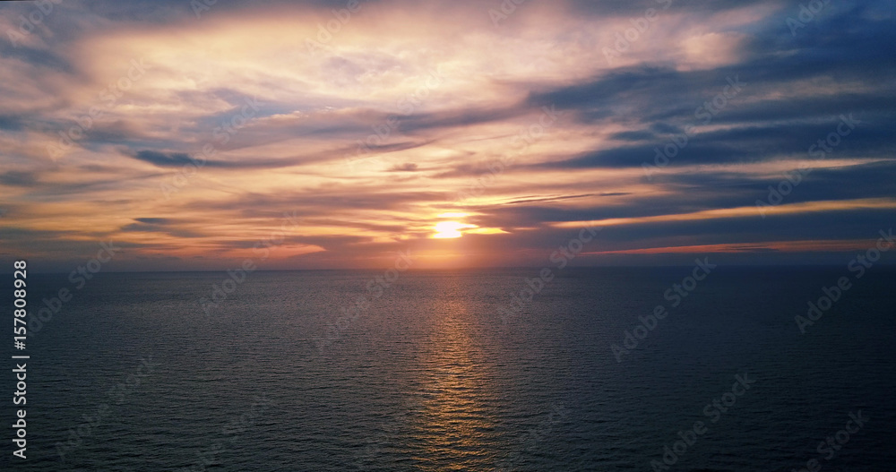 red sunset over the Mediterranean sea. flight.