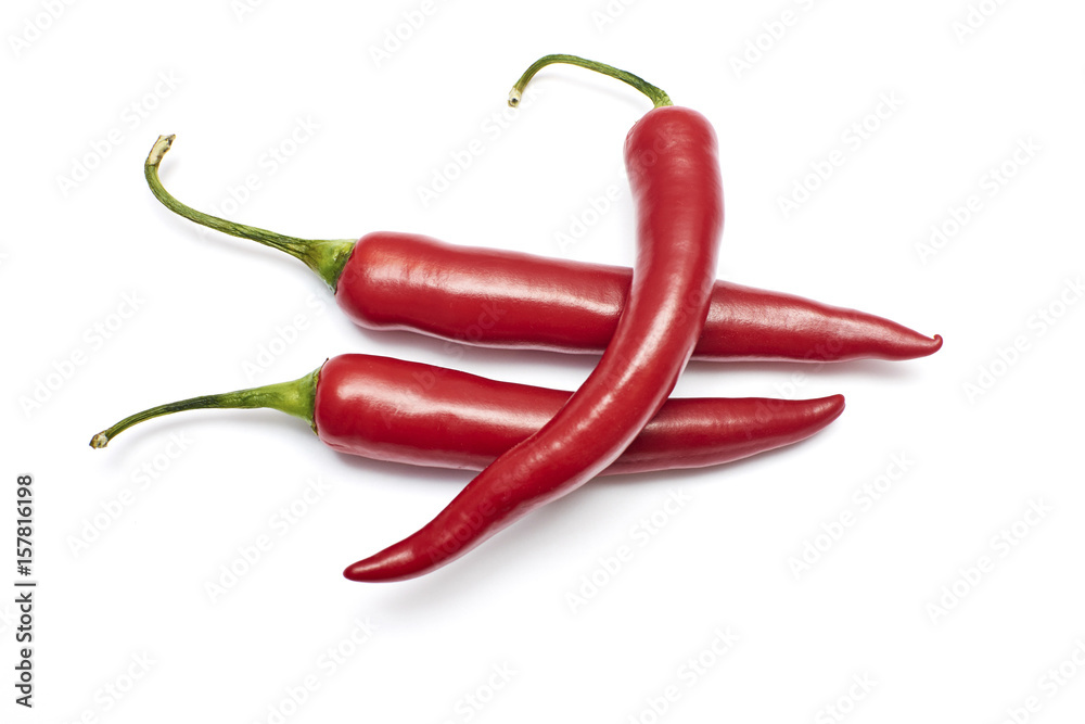 Three red hot chili pepper isolated on a white background Three red hot chili pepper isolated on a white background