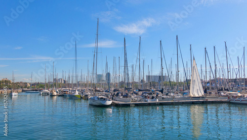 Sailboats moored in the port of barcelona, near the Ramblas and the monument of Columbus. Barcelona, Spain