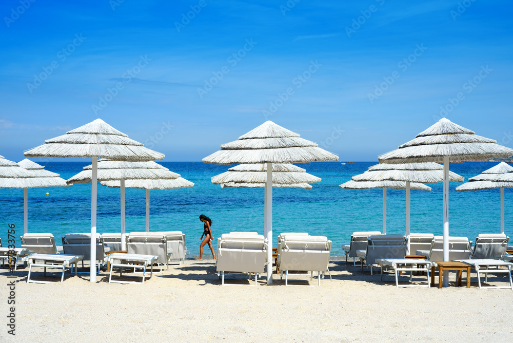 Fototapeta premium white umbrellas on the beach