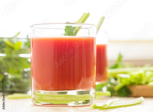 Two glasses of tomato juice.