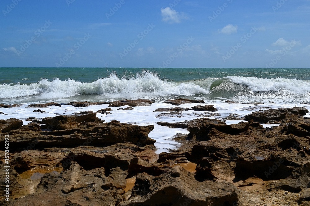 Waves lapping on the reefs. Brazil