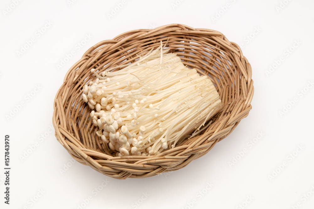 Enoki mushroom in basket weave on white background
