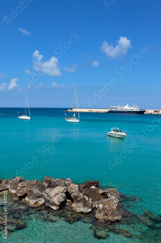 Clear blue waters of Otranto with yachts, Salento, Apulia, Italy © dancar