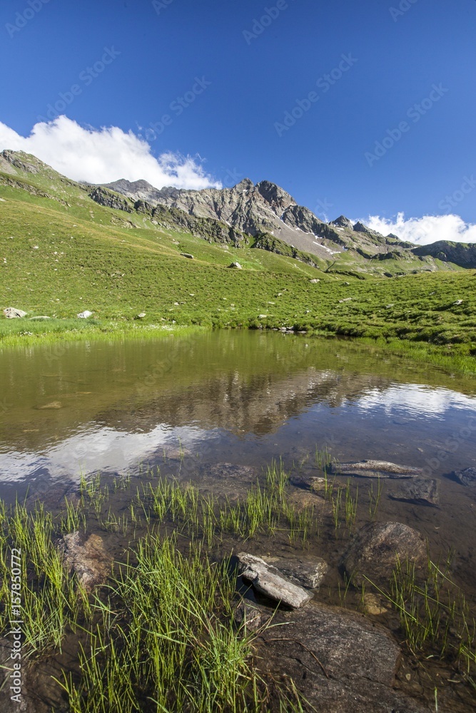 Reflections in the Baldiscio lake. Baldiscio lake, Campodolcino, Vallespluga, Valchiavenna, Lombardy, Italy.