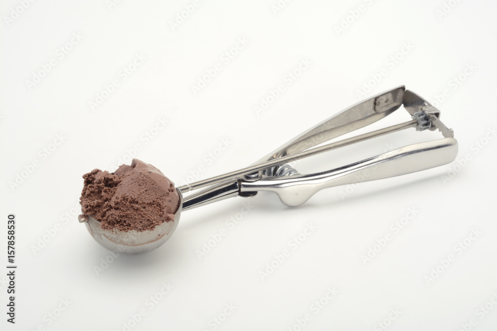 Φωτογραφία Cuchara para hacer bolas de helado con helado de chocolate