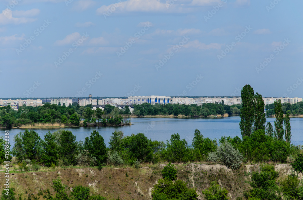 View on a city Komsomolsk and river Dnieper View on a city Komsomolsk and river Dnieper