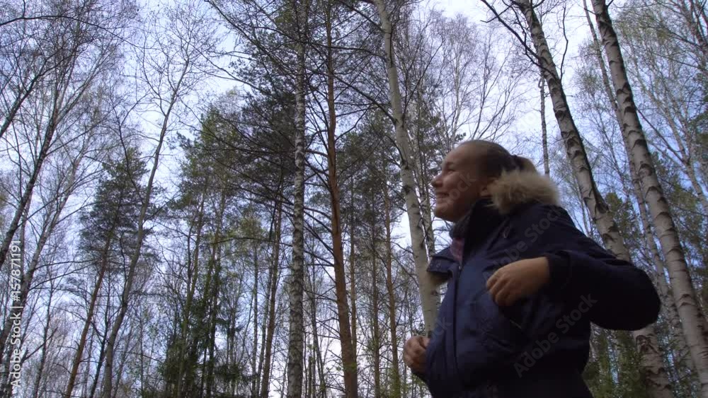 Young Woman Enjoying Spring Forest Young Woman Enjoying Spring Forest