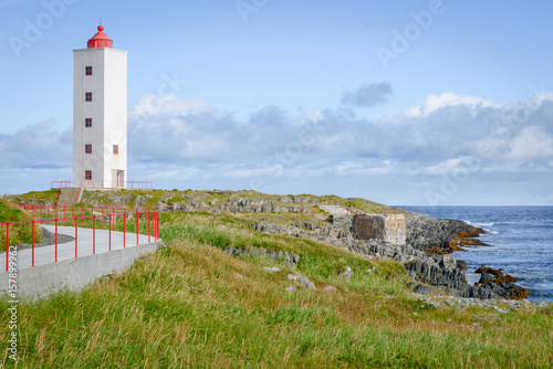 Picturesque lighthouse Kj  lnes near Berlev  g  Finnmark  Norway