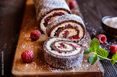 Chocolate roll cake with coconut and raspberry filling
