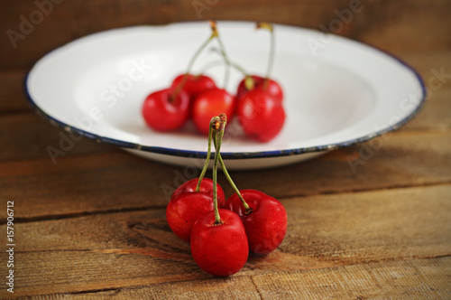 Cherries on a porcelain plate