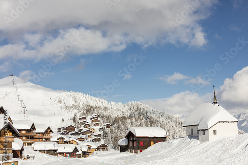 View of the alpine village surrounded by snow and its sky area Bettmeralp district of Raron canton of Valais Switzerland Europe