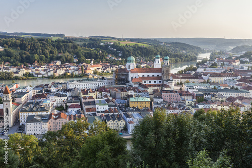 Top view of the typical buildings and houses set among green hills and river Passau Lower Bavaria Germany Europe