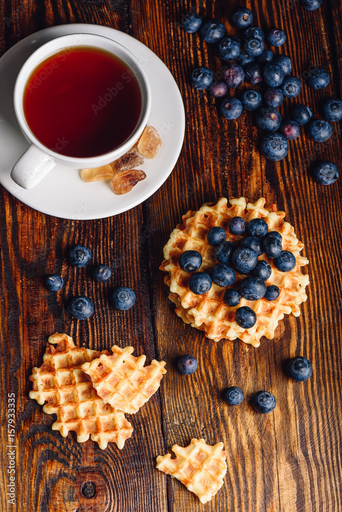 Cup of Tea with Belgian Waffles and Blueberries. Cup of Tea with Belgian Waffles and Blueberries.