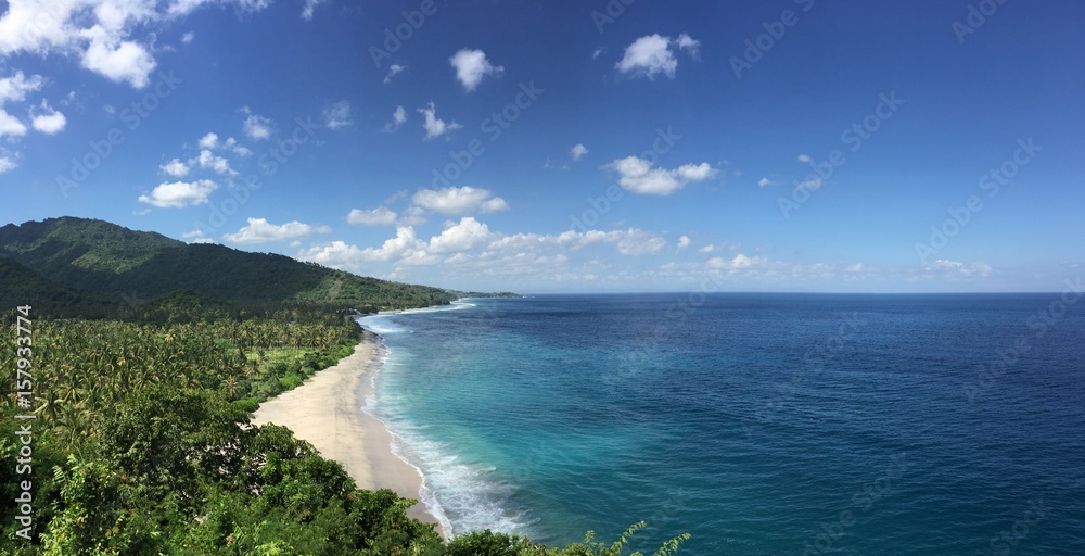 Beautiful blue beach on the coast of Senggigi, Lombok, Indonesia