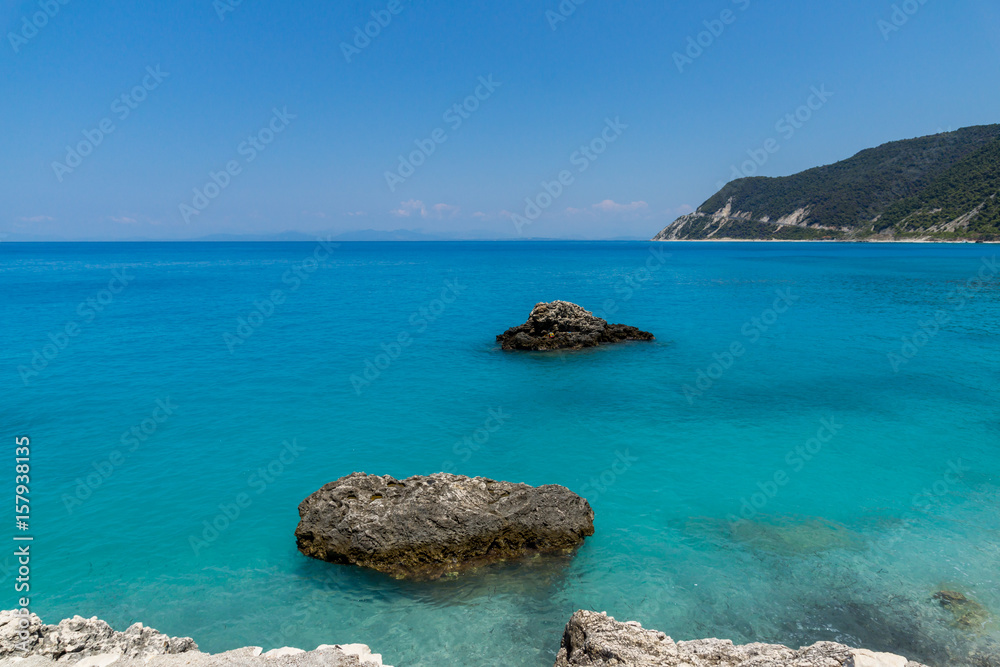 Panoramic view of Agios Nikitas Beach with blue waters, Lefkada, Ionian Islands, Greece Panoramic view of Agios Nikitas Beach with blue waters, Lefkada, Ionian Islands, Greece