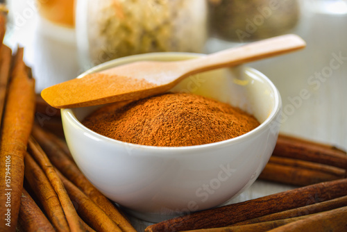 Fototapeta Naklejka Na Ścianę i Meble -  Cinnamon powder in a bowl
