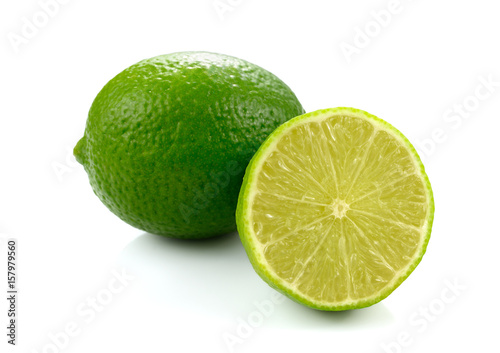 Fresh green lime isolated on white