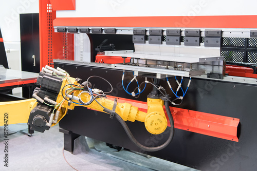 robotic arm machine tool at industrial manufacture plant,Smart factory industry 4.0 concept