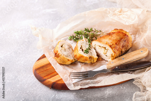Chicken roll and vegetables on a table. Selective focus. Copy space