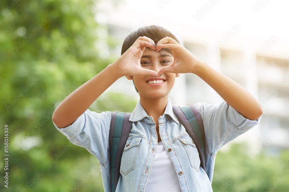 Showing Heart Gesture Outdoors Showing Heart Gesture Outdoors